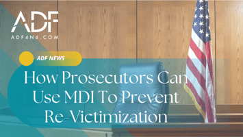 Photo of a witness stand in a court room, the American flag standing beside the stand. A title in the middle reads How Prosecutors Can Use MDI To Prevent Re-Victimization